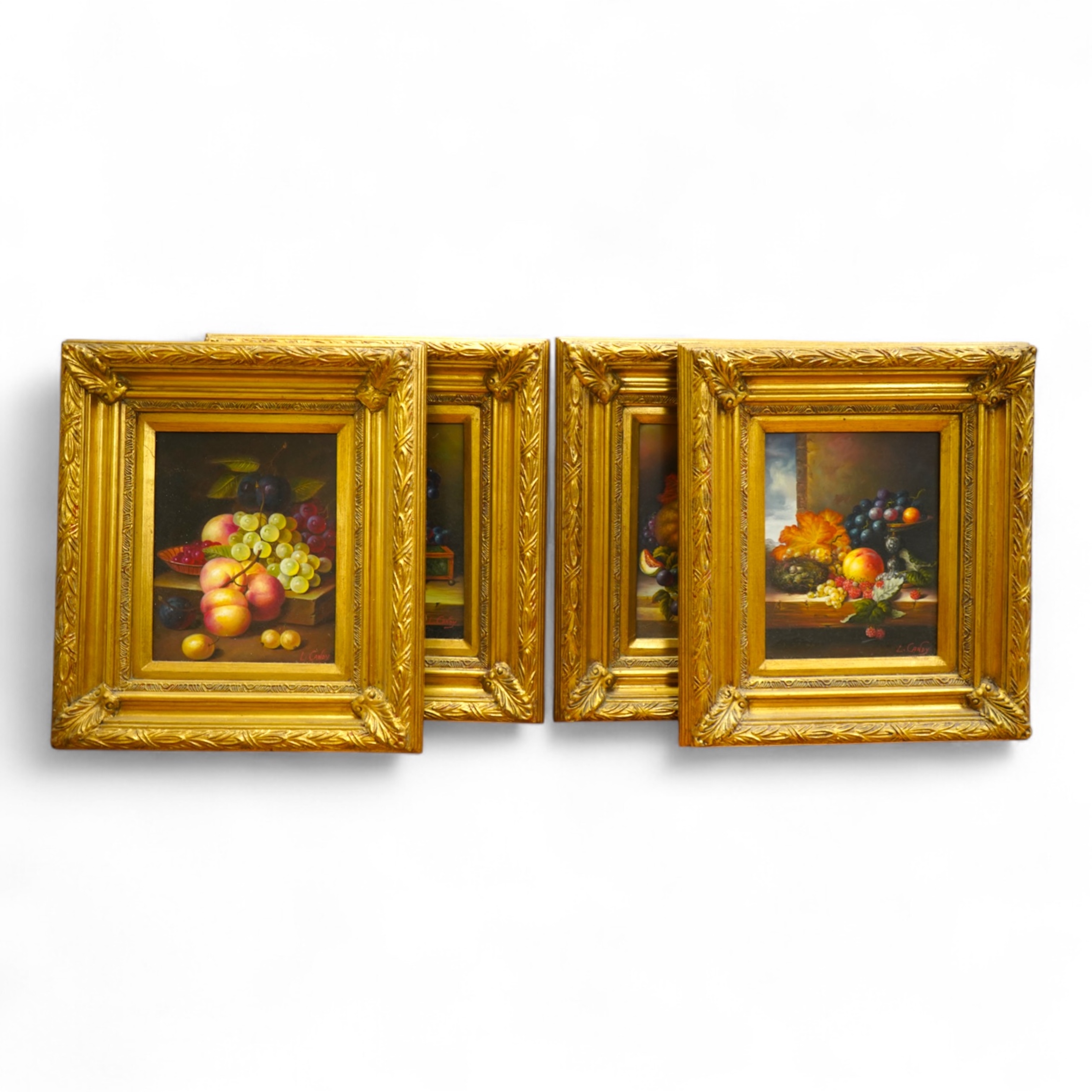 L Candy, Old Master style, Still lifes of fruit and vessels, set of four decorative oils on board, each 25 x 19cm, ornate gilt frames